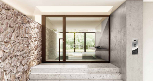 Entrance to a modern home with marble steps